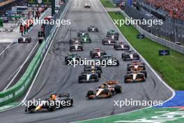 Max Verstappen (NLD) Red Bull Racing RB20 leads at the start of the race. 25.08.2024. Formula 1 World Championship, Rd 15, Dutch Grand Prix, Zandvoort, Netherlands, Race Day.