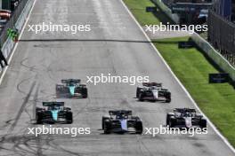 (L to R): Fernando Alonso (ESP) Aston Martin F1 Team AMR24; Alexander Albon (THA) Williams Racing FW46; and Pierre Gasly (FRA) Alpine F1 Team A524, battle for position. 25.08.2024. Formula 1 World Championship, Rd 15, Dutch Grand Prix, Zandvoort, Netherlands, Race Day.