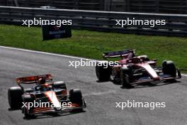 Oscar Piastri (AUS) McLaren MCL38 and Charles Leclerc (MON) Ferrari SF-24 battle for position. 25.08.2024. Formula 1 World Championship, Rd 15, Dutch Grand Prix, Zandvoort, Netherlands, Race Day.