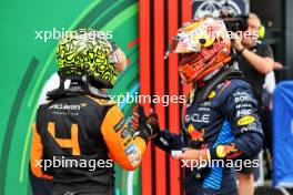 (L to R): Lando Norris (GBR) McLaren celebrates his pole position in qualifying parc ferme with second placed Max Verstappen (NLD) Red Bull Racing. 24.08.2024. Formula 1 World Championship, Rd 15, Dutch Grand Prix, Zandvoort, Netherlands, Qualifying Day.