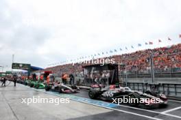 Kevin Magnussen (DEN) Haas VF-24 and Nico Hulkenberg (GER) Haas VF-24 in the pits. 24.08.2024. Formula 1 World Championship, Rd 15, Dutch Grand Prix, Zandvoort, Netherlands, Qualifying Day.