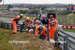 Marshals repair barriers after Logan Sargeant (USA) Williams Racing crashed in the third practice session. 24.08.2024. Formula 1 World Championship, Rd 15, Dutch Grand Prix, Zandvoort, Netherlands, Qualifying Day.