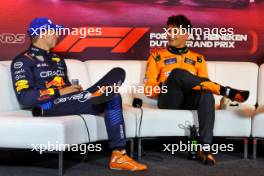 (L to R): Max Verstappen (NLD) Red Bull Racing and Lando Norris (GBR) McLaren in the post qualifying FIA Press Conference. 24.08.2024. Formula 1 World Championship, Rd 15, Dutch Grand Prix, Zandvoort, Netherlands, Qualifying Day.