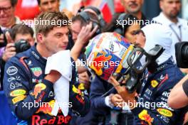 Second placed Max Verstappen (NLD) Red Bull Racing with team mate Sergio Perez (MEX) Red Bull Racing in qualifying parc ferme. 24.08.2024. Formula 1 World Championship, Rd 15, Dutch Grand Prix, Zandvoort, Netherlands, Qualifying Day.