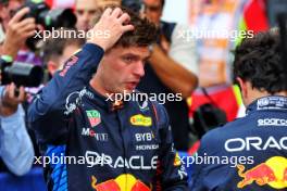 Second placed Max Verstappen (NLD) Red Bull Racing with team mate Sergio Perez (MEX) Red Bull Racing in qualifying parc ferme. 24.08.2024. Formula 1 World Championship, Rd 15, Dutch Grand Prix, Zandvoort, Netherlands, Qualifying Day.