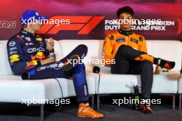 (L to R): Max Verstappen (NLD) Red Bull Racing and Lando Norris (GBR) McLaren in the post qualifying FIA Press Conference. 24.08.2024. Formula 1 World Championship, Rd 15, Dutch Grand Prix, Zandvoort, Netherlands, Qualifying Day.