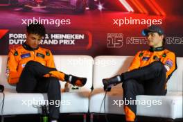 (L to R): Max Verstappen (NLD) Red Bull Racing and Lando Norris (GBR) McLaren in the post qualifying FIA Press Conference. 24.08.2024. Formula 1 World Championship, Rd 15, Dutch Grand Prix, Zandvoort, Netherlands, Qualifying Day.