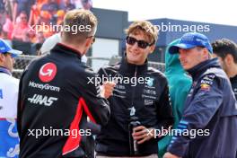 (L to R): Nico Hulkenberg (GER) Haas F1 Team with George Russell (GBR) Mercedes AMG F1 and Max Verstappen (NLD) Red Bull Racing on the drivers' parade. 25.08.2024. Formula 1 World Championship, Rd 15, Dutch Grand Prix, Zandvoort, Netherlands, Race Day.