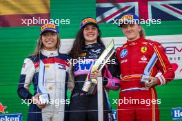 The podium (L to R): Nerea Marti (ESP) Campos Racing, second; Abbi Pulling (GBR) Rodin Motorsport, race winner; Maya Weug (NLD) Prema, third. 25.08.2024. FIA Formula Academy, Rd 4, Race 1, Zandvoort, Netherlands, Sunday.