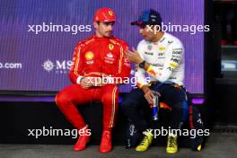 (L to R): Charles Leclerc (MON) Ferrari with Sergio Perez (MEX) Red Bull Racing in qualifying parc ferme. 08.03.2024. Formula 1 World Championship, Rd 2, Saudi Arabian Grand Prix, Jeddah, Saudi Arabia, Qualifying Day.