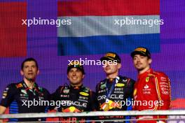 The podium (L to R): Jerome Lafarge, Red Bull Racing; Sergio Perez (MEX) Red Bull Racing, second; Max Verstappen (NLD) Red Bull Racing, race winner; Charles Leclerc (MON) Ferrari, third. 09.03.2024. Formula 1 World Championship, Rd 2, Saudi Arabian Grand Prix, Jeddah, Saudi Arabia, Race Day.