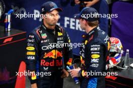 (L to R): Second placed Sergio Perez (MEX) Red Bull Racing and race winner Max Verstappen (NLD) Red Bull Racing in parc ferme. 09.03.2024. Formula 1 World Championship, Rd 2, Saudi Arabian Grand Prix, Jeddah, Saudi Arabia, Race Day.