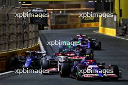 Yuki Tsunoda (JPN) RB VCARB 01 leads Kevin Magnussen (DEN) Haas VF-24 and Alexander Albon (THA) Williams Racing FW46. 09.03.2024. Formula 1 World Championship, Rd 2, Saudi Arabian Grand Prix, Jeddah, Saudi Arabia, Race Day.