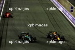 Lewis Hamilton (GBR) Mercedes AMG F1 W15 and Sergio Perez (MEX) Red Bull Racing RB20 battle for position. 09.03.2024. Formula 1 World Championship, Rd 2, Saudi Arabian Grand Prix, Jeddah, Saudi Arabia, Race Day.