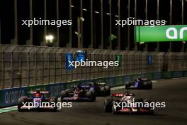 (L to R): Yuki Tsunoda (JPN) RB VCARB 01 and Kevin Magnussen (DEN) Haas VF-24 battle for position. 09.03.2024. Formula 1 World Championship, Rd 2, Saudi Arabian Grand Prix, Jeddah, Saudi Arabia, Race Day.
