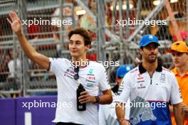 (L to R): George Russell (GBR) Mercedes AMG F1 and Daniel Ricciardo (AUS) RB on the drivers' parade. 09.03.2024. Formula 1 World Championship, Rd 2, Saudi Arabian Grand Prix, Jeddah, Saudi Arabia, Race Day.