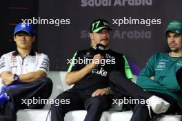 (L to R): Yuki Tsunoda (JPN) RB; Valtteri Bottas (FIN) Sauber; and Lance Stroll (CDN) Aston Martin F1 Team, in the FIA Press Conference. 06.03.2024. Formula 1 World Championship, Rd 2, Saudi Arabian Grand Prix, Jeddah, Saudi Arabia, Preparation Day.