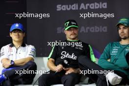 (L to R): Yuki Tsunoda (JPN) RB; Valtteri Bottas (FIN) Sauber; and Lance Stroll (CDN) Aston Martin F1 Team, in the FIA Press Conference. 06.03.2024. Formula 1 World Championship, Rd 2, Saudi Arabian Grand Prix, Jeddah, Saudi Arabia, Preparation Day.