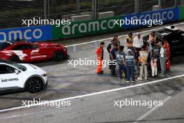 Circuit atmosphere - Niels Wittich (GER) FIA F1 Race Director oversees a manhole cover repair. 20.09.2024. Formula 1 World Championship, Rd 18, Singapore Grand Prix, Marina Bay Street Circuit, Singapore, Practice Day.