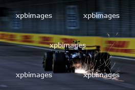 Nico Hulkenberg (GER) Haas VF-24 sends sparks flying. 20.09.2024. Formula 1 World Championship, Rd 18, Singapore Grand Prix, Marina Bay Street Circuit, Singapore, Practice Day.