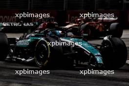 George Russell (GBR) Mercedes AMG F1 W15 with a broken front wing. 20.09.2024. Formula 1 World Championship, Rd 18, Singapore Grand Prix, Marina Bay Street Circuit, Singapore, Practice Day.