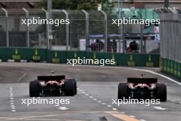 Carlos Sainz Jr (ESP) Ferrari SF-24 and Charles Leclerc (MON) Ferrari SF-24. 20.09.2024. Formula 1 World Championship, Rd 18, Singapore Grand Prix, Marina Bay Street Circuit, Singapore, Practice Day.