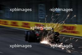 Max Verstappen (NLD) Red Bull Racing RB20 sends sparks flying. 20.09.2024. Formula 1 World Championship, Rd 18, Singapore Grand Prix, Marina Bay Street Circuit, Singapore, Practice Day.