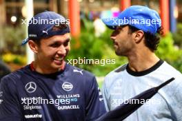 (L to R): Alexander Albon (THA) Williams Racing and Daniel Ricciardo (AUS) RB. 20.09.2024. Formula 1 World Championship, Rd 18, Singapore Grand Prix, Marina Bay Street Circuit, Singapore, Practice Day.