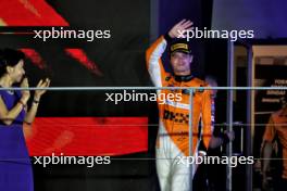 Race winner Lando Norris (GBR) McLaren celebrates on the podium. 22.09.2024. Formula 1 World Championship, Rd 18, Singapore Grand Prix, Marina Bay Street Circuit, Singapore, Race Day.