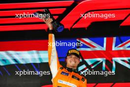 Race winner Lando Norris (GBR) McLaren celebrates on the podium. 22.09.2024. Formula 1 World Championship, Rd 18, Singapore Grand Prix, Marina Bay Street Circuit, Singapore, Race Day.