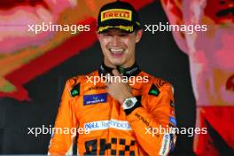 Race winner Lando Norris (GBR) McLaren celebrates on the podium. 22.09.2024. Formula 1 World Championship, Rd 18, Singapore Grand Prix, Marina Bay Street Circuit, Singapore, Race Day.