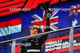 Race winner Lando Norris (GBR) McLaren celebrates on the podium. 22.09.2024. Formula 1 World Championship, Rd 18, Singapore Grand Prix, Marina Bay Street Circuit, Singapore, Race Day.