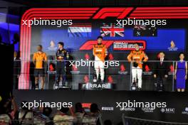 The podium (L to R): Max Verstappen (NLD) Red Bull Racing, second; Lando Norris (GBR) McLaren, race winner; Oscar Piastri (AUS) McLaren, third. 22.09.2024. Formula 1 World Championship, Rd 18, Singapore Grand Prix, Marina Bay Street Circuit, Singapore, Race Day.