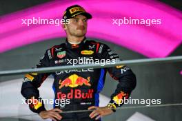 Max Verstappen (NLD) Red Bull Racing celebrates his second position on the podium. 22.09.2024. Formula 1 World Championship, Rd 18, Singapore Grand Prix, Marina Bay Street Circuit, Singapore, Race Day.