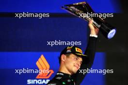 Race winner Lando Norris (GBR) McLaren celebrates on the podium. 22.09.2024. Formula 1 World Championship, Rd 18, Singapore Grand Prix, Marina Bay Street Circuit, Singapore, Race Day.