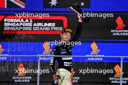 Race winner Lando Norris (GBR) McLaren celebrates on the podium. 22.09.2024. Formula 1 World Championship, Rd 18, Singapore Grand Prix, Marina Bay Street Circuit, Singapore, Race Day.