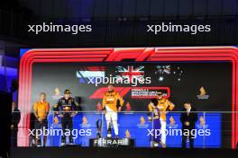 The podium (L to R): Max Verstappen (NLD) Red Bull Racing, second; Lando Norris (GBR) McLaren, race winner; Oscar Piastri (AUS) McLaren, third. 22.09.2024. Formula 1 World Championship, Rd 18, Singapore Grand Prix, Marina Bay Street Circuit, Singapore, Race Day.