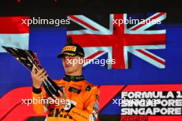 Race winner Lando Norris (GBR) McLaren celebrates on the podium. 22.09.2024. Formula 1 World Championship, Rd 18, Singapore Grand Prix, Marina Bay Street Circuit, Singapore, Race Day.