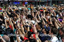 Circuit atmosphere - fans on the circuit at the podium. 22.09.2024. Formula 1 World Championship, Rd 18, Singapore Grand Prix, Marina Bay Street Circuit, Singapore, Race Day.