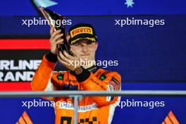 Race winner Lando Norris (GBR) McLaren celebrates on the podium. 22.09.2024. Formula 1 World Championship, Rd 18, Singapore Grand Prix, Marina Bay Street Circuit, Singapore, Race Day.