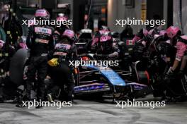 Esteban Ocon (FRA) Alpine F1 Team A524 makes a pit stop. 22.09.2024. Formula 1 World Championship, Rd 18, Singapore Grand Prix, Marina Bay Street Circuit, Singapore, Race Day.