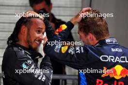 (L to R): Lewis Hamilton (GBR) Mercedes AMG F1 in qualifying parc ferme with Max Verstappen (NLD) Red Bull Racing. 21.09.2024. Formula 1 World Championship, Rd 18, Singapore Grand Prix, Marina Bay Street Circuit, Singapore, Qualifying Day.