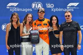 Lando Norris (GBR) McLaren is presented the Pirelli Pole Position Award by The Corrs. 21.09.2024. Formula 1 World Championship, Rd 18, Singapore Grand Prix, Marina Bay Street Circuit, Singapore, Qualifying Day.