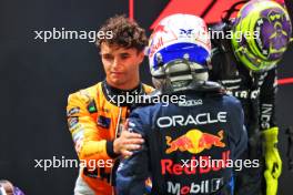 (L to R): Pole sitter Lando Norris (GBR) McLaren in qualifying parc ferme with second placed Max Verstappen (NLD) Red Bull Racing and third placed Lewis Hamilton (GBR) Mercedes AMG F1. 21.09.2024. Formula 1 World Championship, Rd 18, Singapore Grand Prix, Marina Bay Street Circuit, Singapore, Qualifying Day.