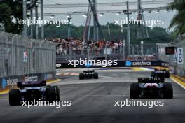 (L to R): Alexander Albon (THA) Williams Racing FW46 and Esteban Ocon (FRA) Alpine F1 Team A524. 21.09.2024. Formula 1 World Championship, Rd 18, Singapore Grand Prix, Marina Bay Street Circuit, Singapore, Qualifying Day.