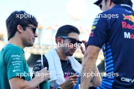 Esteban Ocon (FRA) Alpine F1 Team with Lance Stroll (CDN) Aston Martin F1 Team and Sergio Perez (MEX) Red Bull Racing on the drivers' parade. 22.09.2024. Formula 1 World Championship, Rd 18, Singapore Grand Prix, Marina Bay Street Circuit, Singapore, Race Day.