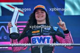 Race winner Abbi Pulling (GBR) Rodin Motorsport celebrates on the podium. 22.09.2024. FIA Formula Academy, Rd 5, Race 2, Marina Bay Street Circuit, Singapore, Sunday.