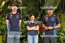 (L to R): Max Verstappen (NLD) Red Bull Racing with Hamda Al Qubaisi (UAE) MP Motorsport F1 Academy Driver; and Sergio Perez (MEX) Red Bull Racing. 19.09.2024. Formula 1 World Championship, Rd 18, Singapore Grand Prix, Marina Bay Street Circuit, Singapore, Preparation Day.