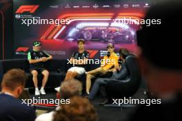  (L to R): Valtteri Bottas (FIN) Sauber; George Russell (GBR) Mercedes AMG F1; and Oscar Piastri (AUS) McLaren, in the FIA Press Conference. 19.09.2024. Formula 1 World Championship, Rd 18, Singapore Grand Prix, Marina Bay Street Circuit, Singapore, Preparation Day.