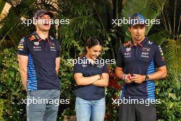 (L to R): Max Verstappen (NLD) Red Bull Racing with Hamda Al Qubaisi (UAE) MP Motorsport F1 Academy Driver; and Sergio Perez (MEX) Red Bull Racing. 19.09.2024. Formula 1 World Championship, Rd 18, Singapore Grand Prix, Marina Bay Street Circuit, Singapore, Preparation Day.